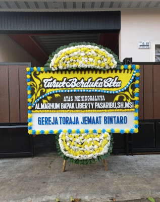 Papan Bunga Duka di Munjul